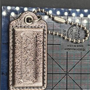 Metallic Hangtag Coach